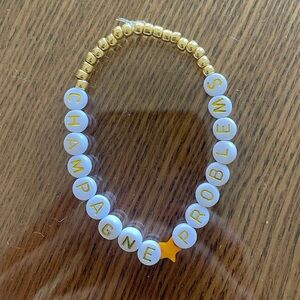 Taylor swift eras tour champagne problems friendship bracelet